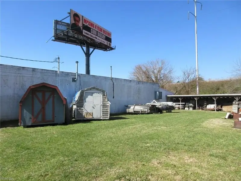 2-story Commercial Building with Office, Warehouse, and Apartments in W Pembroke