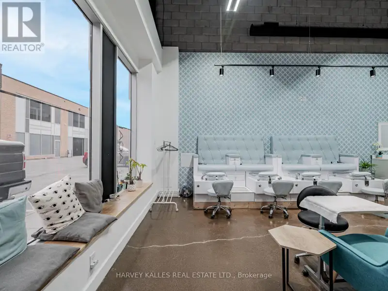 Fully Leased Commercial Condo in Prime Location on the Queensway