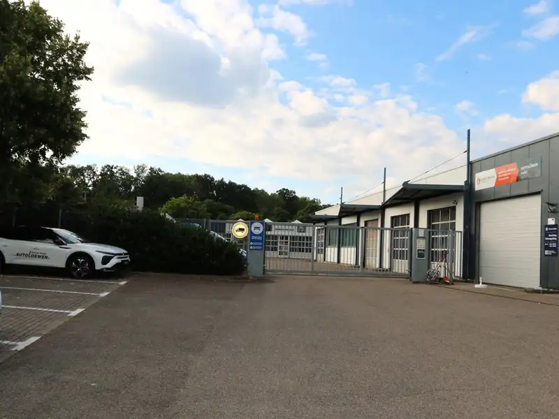Modern Car Dealership and Service Facility with Residential Space in Schwäbisch Hall