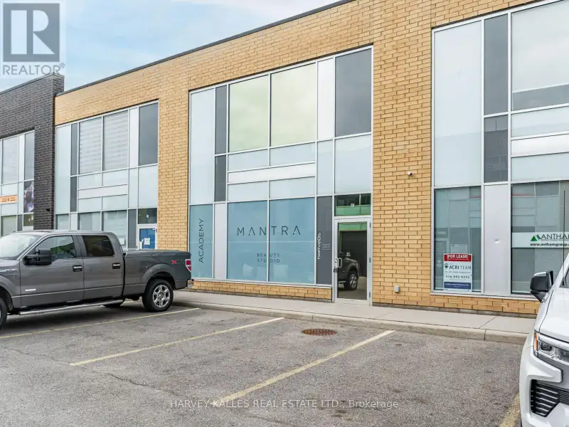 Fully Leased Commercial Condo in Prime Location on the Queensway