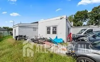Turnkey Automotive Business with Car Dealership, Mechanic & Auto Body Shop in Prime Location