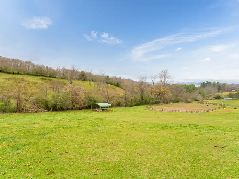 Unique 268-acre Asheville Property with Mountain Views, Homestead, and Horse Facilities