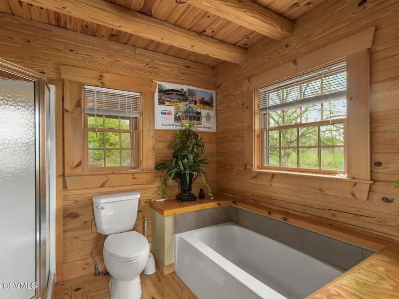 Commercial Log Home on 2 Acres with 3 Bedrooms and Scenic Views