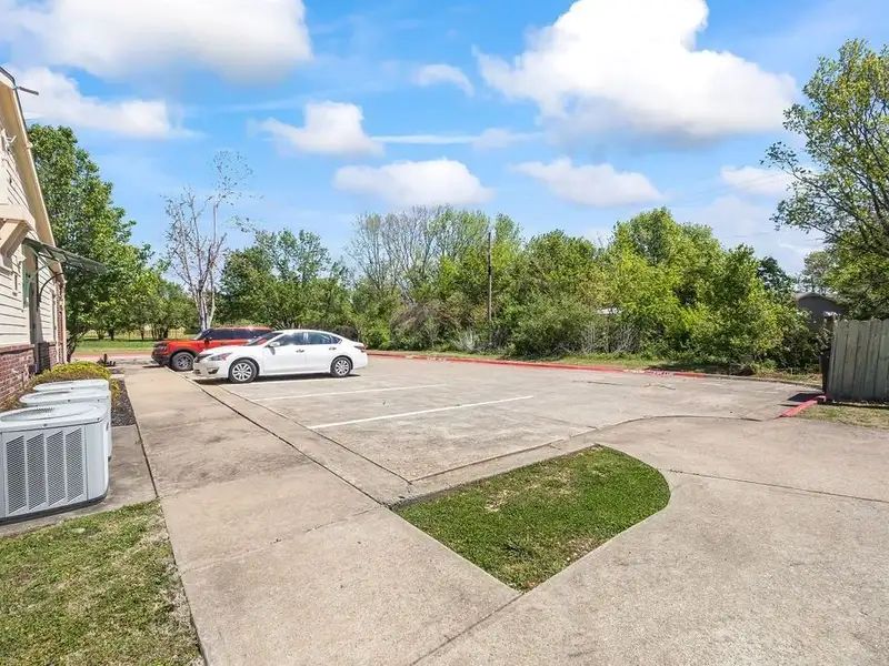 Versatile 2,752 Sq Ft Office Building in Central Rogers with Five Private Offices