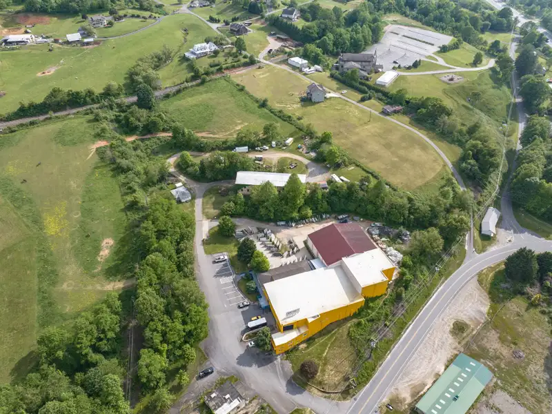Historic 1918 Stone Building with 3.99 Acres and Detached Workshop in Balsam Road Area
