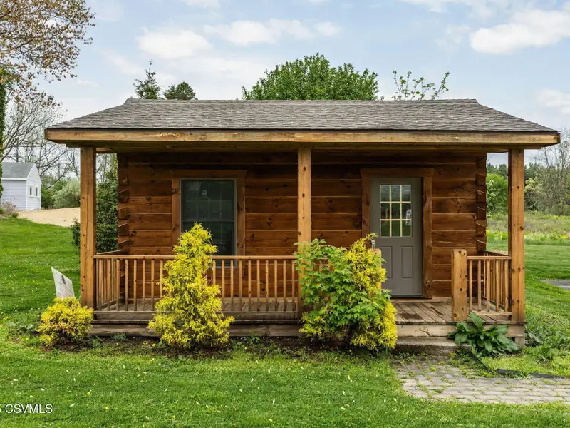 Commercial Log Home on 2 Acres with 3 Bedrooms and Scenic Views