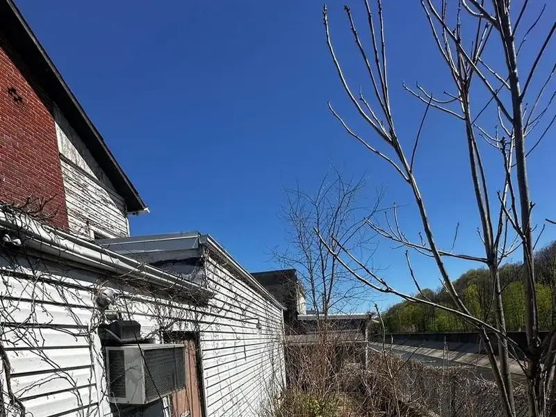 Large Commercial Building with Unique Floor Plan and Adjacent City-owned Lot for Sale