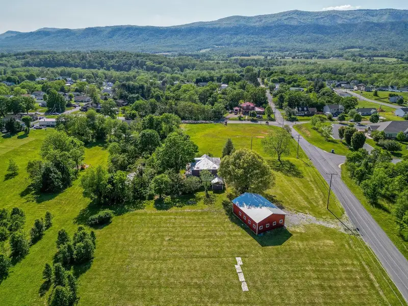 Classic American Foursquare Home in Need of Restoration with Detached Garage