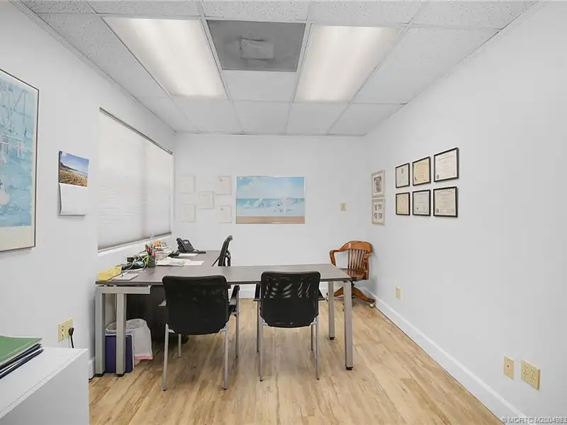 Versatile Office Building with Therapy Rooms and Break Area in R-3a Zoning