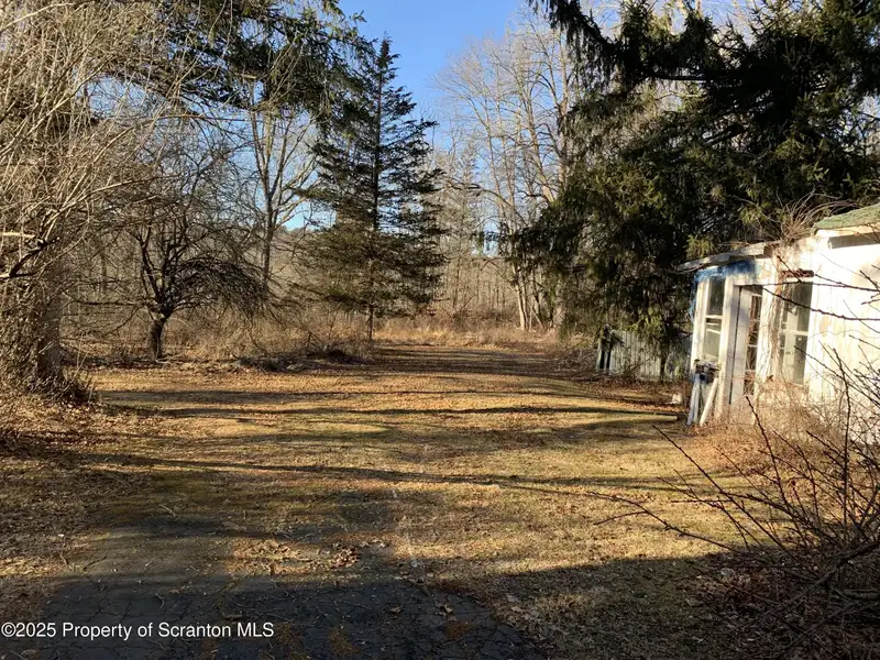 2 Acres of Commercial Property with 3-bedroom House in High-traffic Location