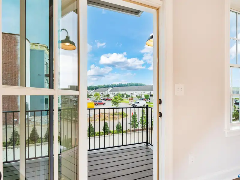 Live/work Townhome with Flex Space, Gourmet Kitchen, and 2-car Garage in Prime Location