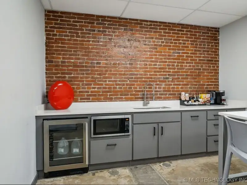 Historic Office Building with 9 Private Suites and Conference Room in Prime Location