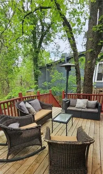 Charming Airbnb Cottage on Historic Loop with Upgrades and Large Entertaining Deck