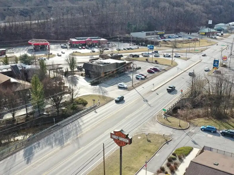 Versatile Commercial Property with Showroom, Offices, and Large Metal Building in Prime Location