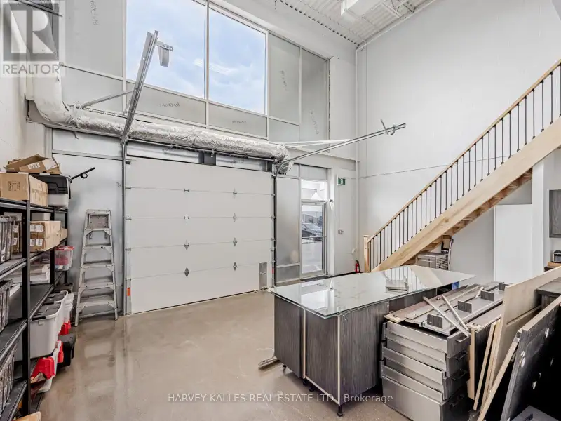 Fully Leased Commercial Condo in Prime Location on the Queensway