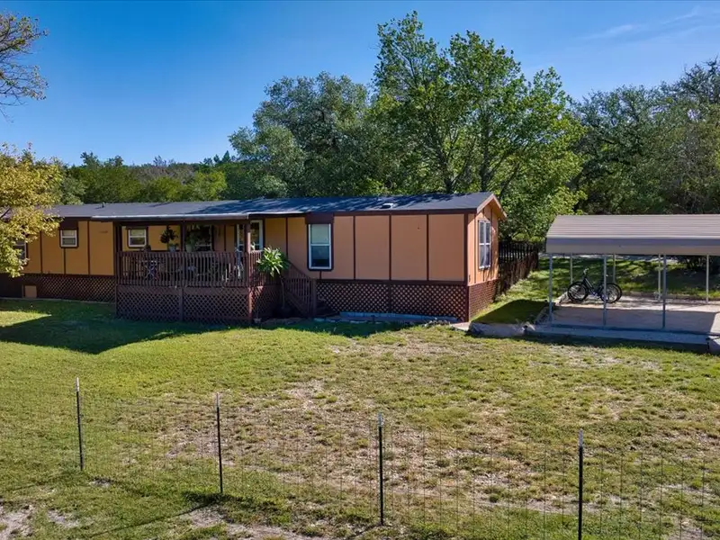 10-acre Mobile Home Community with 5 Units, Fenced, Workshop, and Growth Potential