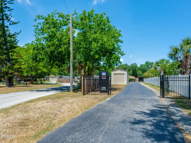 Mixed Use Property: Light Industrial Lot with Adjoining Residential Home and Expansion Potential