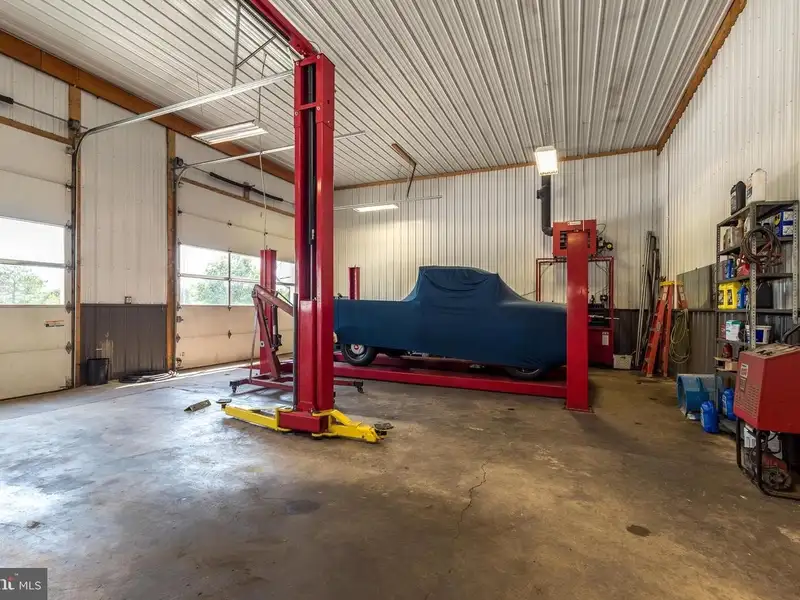Auto Repair Shop with Residential Income Opportunity in Prime Location
