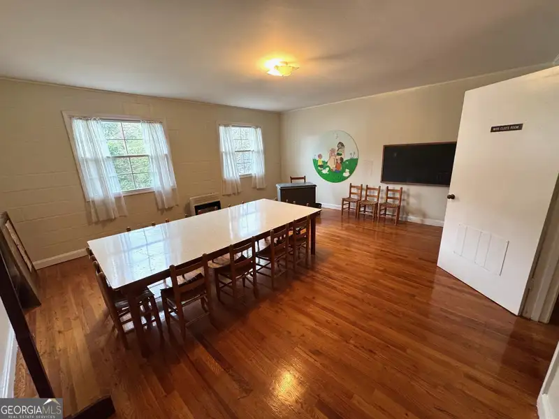 Multi-use Church Property with Sanctuary, Classrooms, Fellowship Hall, and Ample Parking