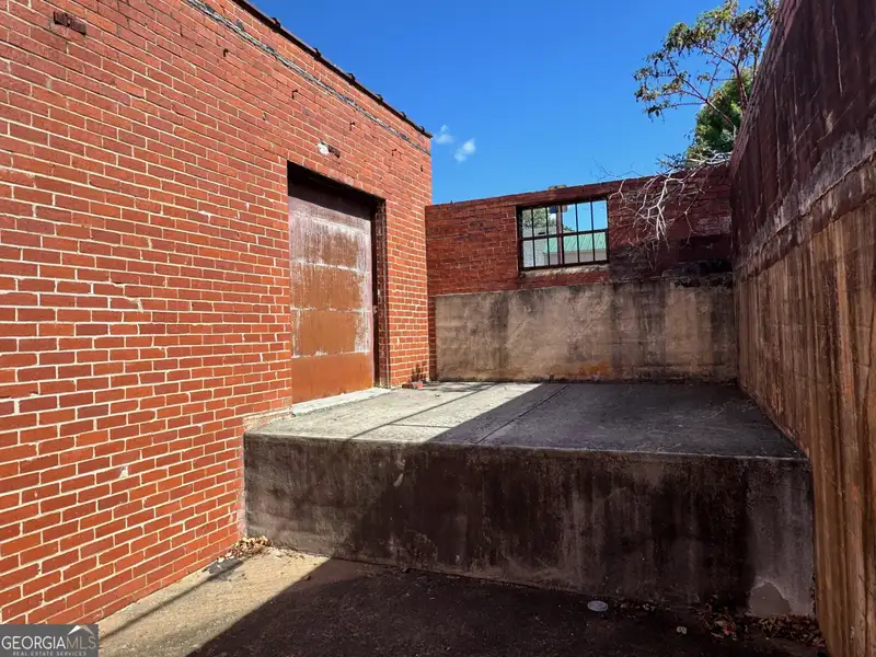 Versatile 5,000 Sq Ft Warehouse Near Downtown Gainesville with Dock and Roll-up Doors