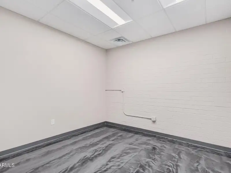 Versatile Commercial Property with Two Buildings and Ample Parking in Prime Location