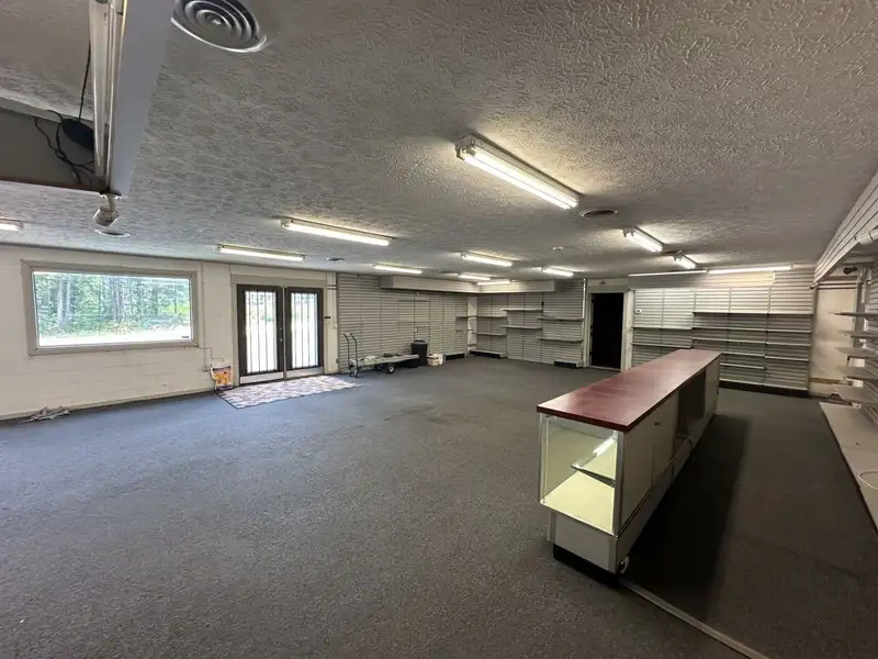 Versatile Commercial Building Near City Limits with Ample Parking and Open Layout