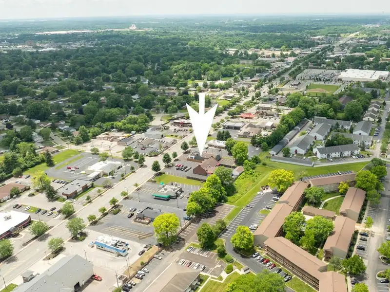 Prime Commercial Building in Downtown Reynoldsburg with Parking and Industrial Garage