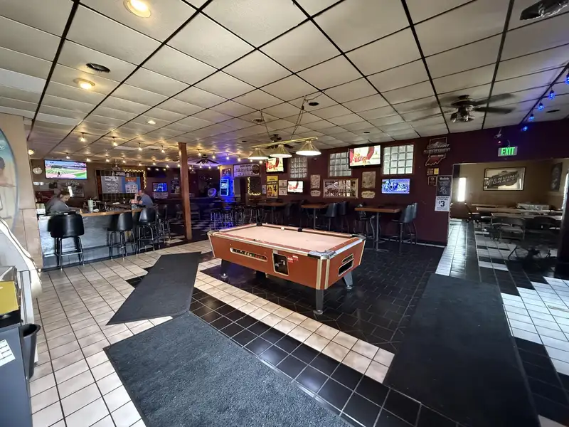 Turnkey Restaurant and Bar with Income-generating Tenants on Prime .62-acre Lot