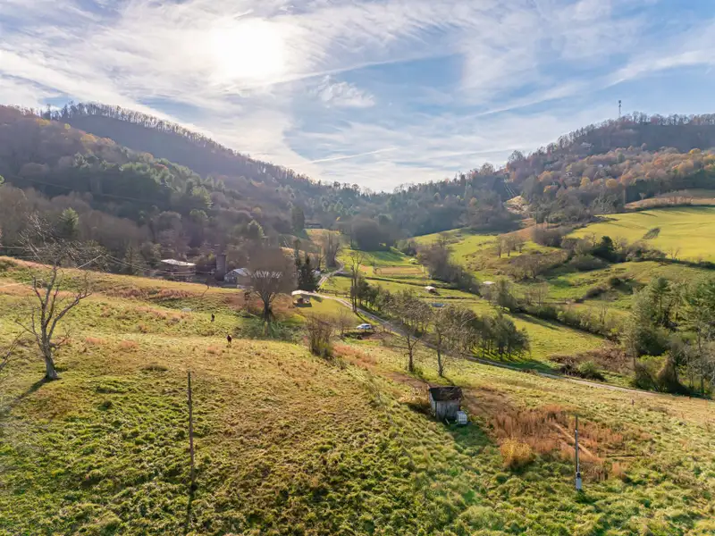 Unique 268-acre Asheville Property with Mountain Views, Homestead, and Horse Facilities