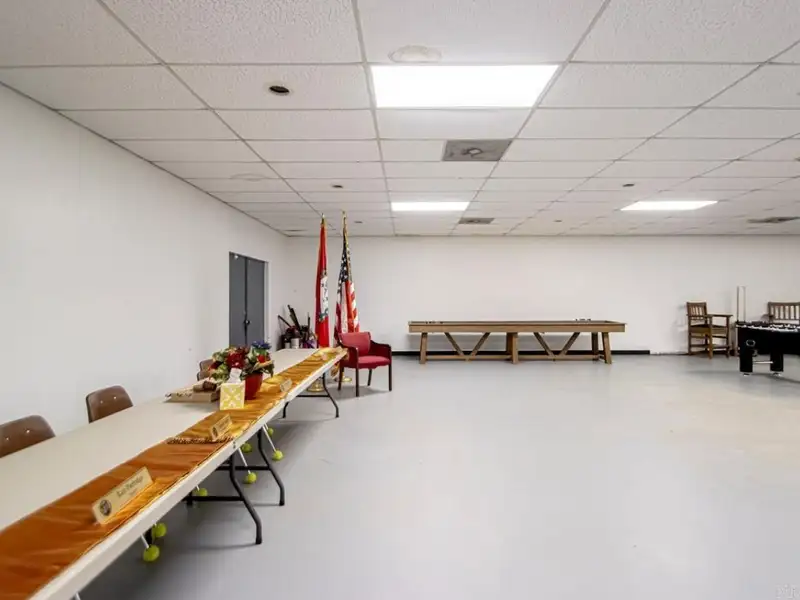 Office Space with Meeting Area, Kitchen, and Security Features in Convenient Location