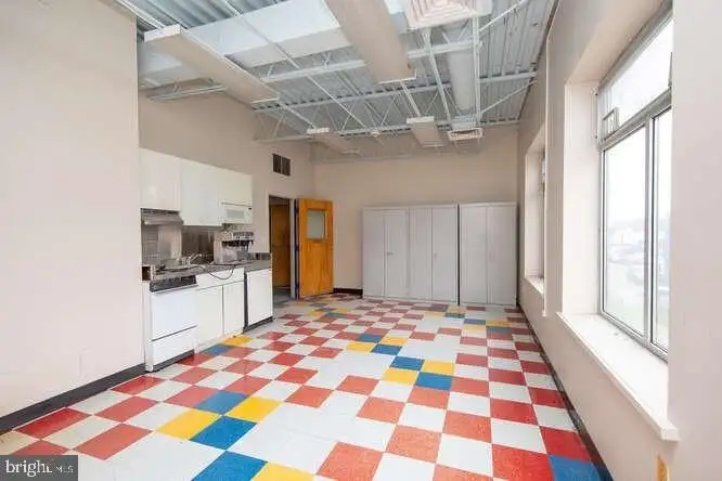 Versatile 6,000 Sq Ft Commercial Space in Prime Location with Parking Potential