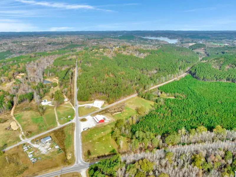 Prime Commercial Property Near Smith Lake with 3,800 Sq Ft Building and Billboard Income