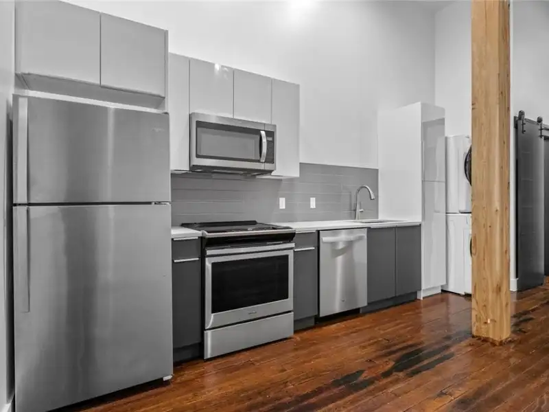 Mixed-use Commercial Property with Retail Space and Renovated Apartments in Downtown Joplin