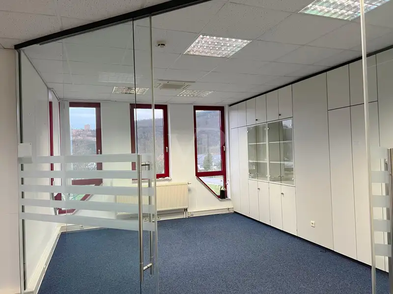 Versatile Company Building with Apartments, Offices, and Storage in Prime Location