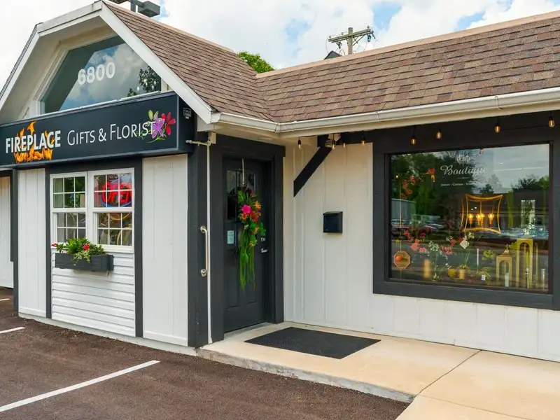 Prime Commercial Building in Downtown Reynoldsburg with Parking and Industrial Garage