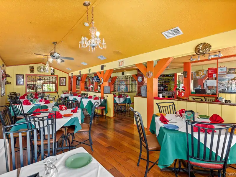 Prime Commercial Property with Restaurant and Retail Space on High-traffic Road