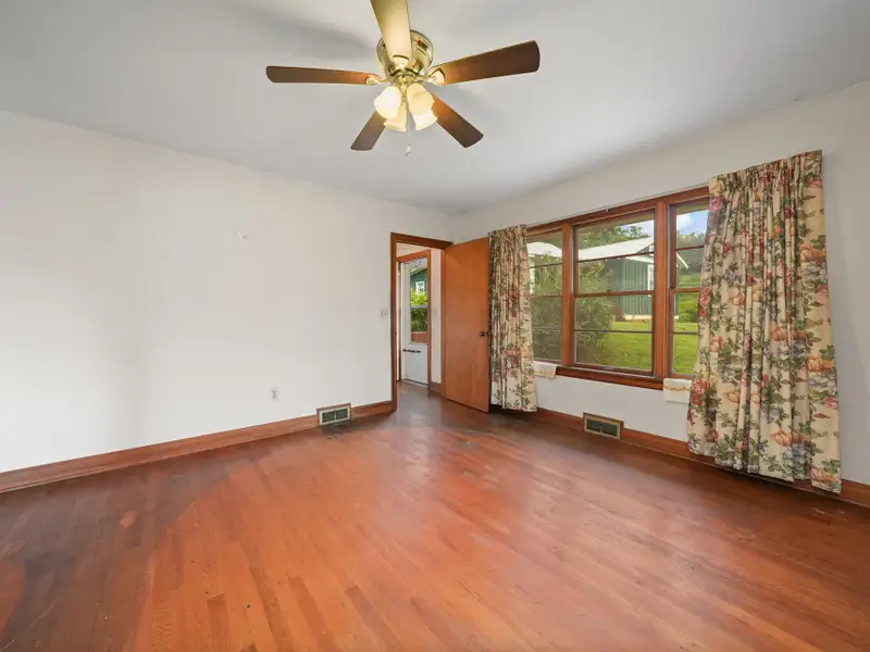 Prime 2.58-acre Multifunctional Property with Ranch Home and Outbuildings Near High-traffic Area