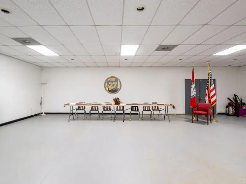 Office Space with Meeting Area, Kitchen, and Security Features in Convenient Location
