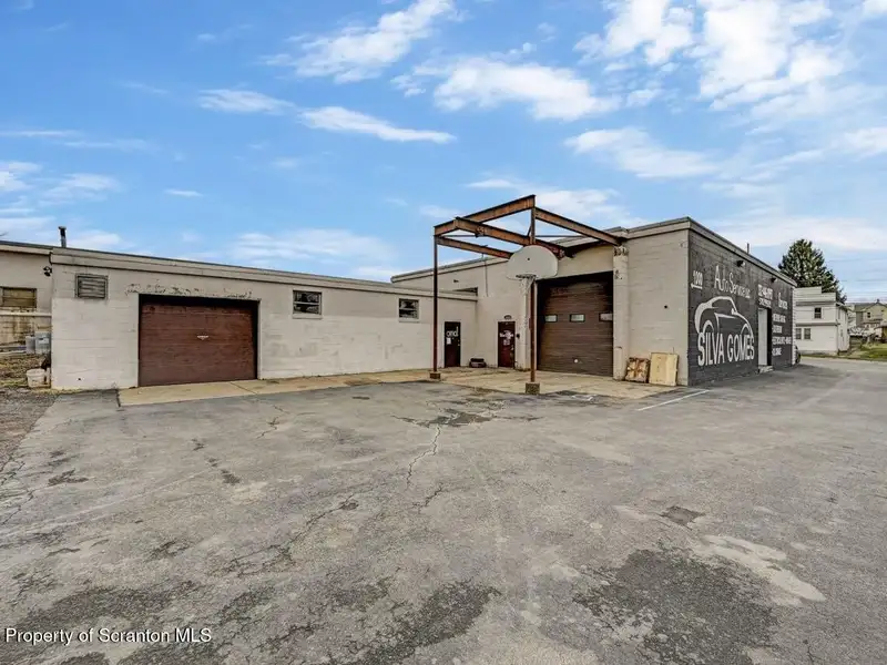 Mixed-use Building with Retail Space and Parking for Sale in Prime Location