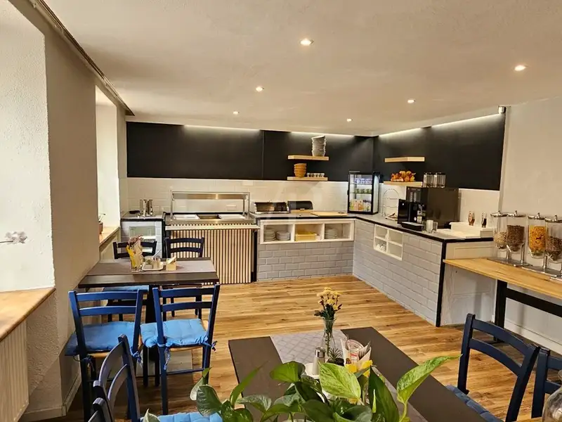 Historic Family-run Hotel in Ansbach with Restaurant, Guest Rooms, and Green Energy Features