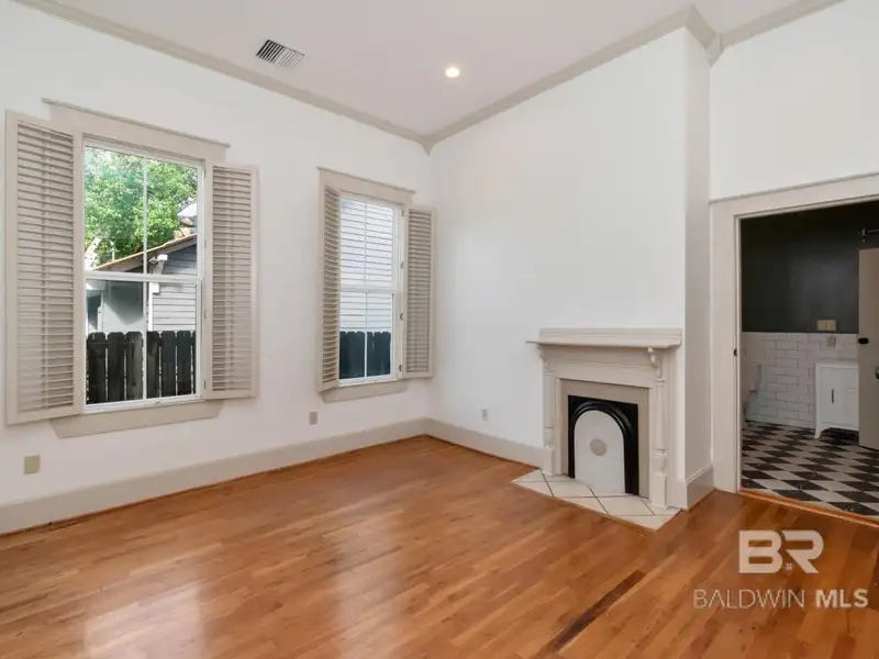 Mixed-use Property in Downtown Mobile, Alabama with High Ceilings and Hardwood Floors