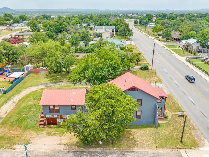 Historic Two-story Commercial Building with Garage Loft Apartment in Prime Location