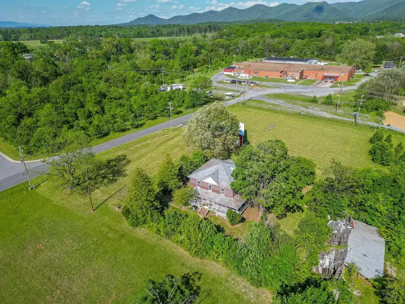Classic American Foursquare Home in Need of Restoration with Detached Garage