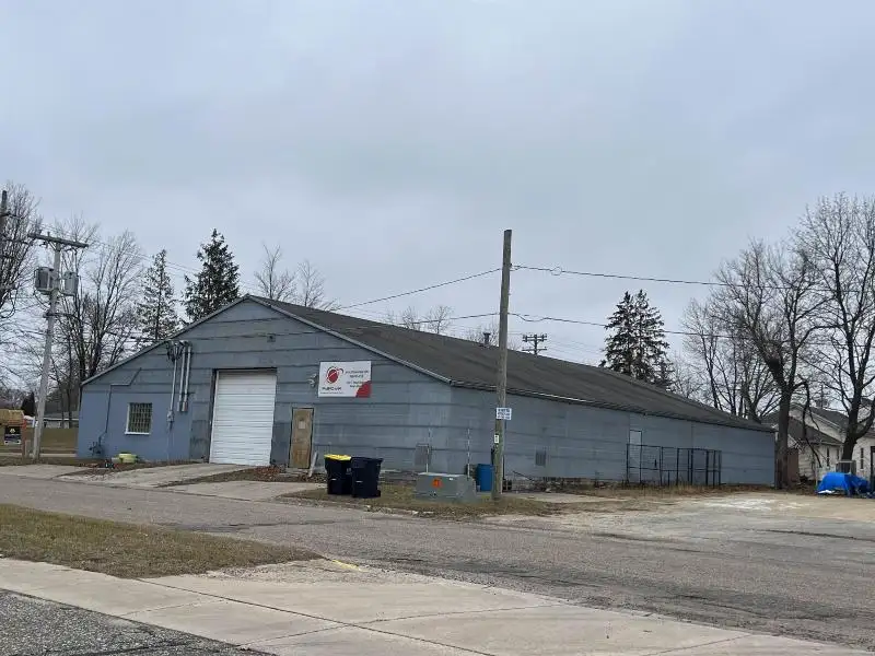 Versatile Mixed-use Property with Office Space and Storage in Residential Area