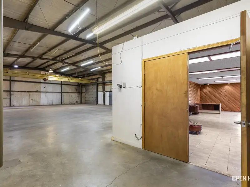 Insulated Warehouse and Office Space with Crane, Fenced Yard in Prime Location