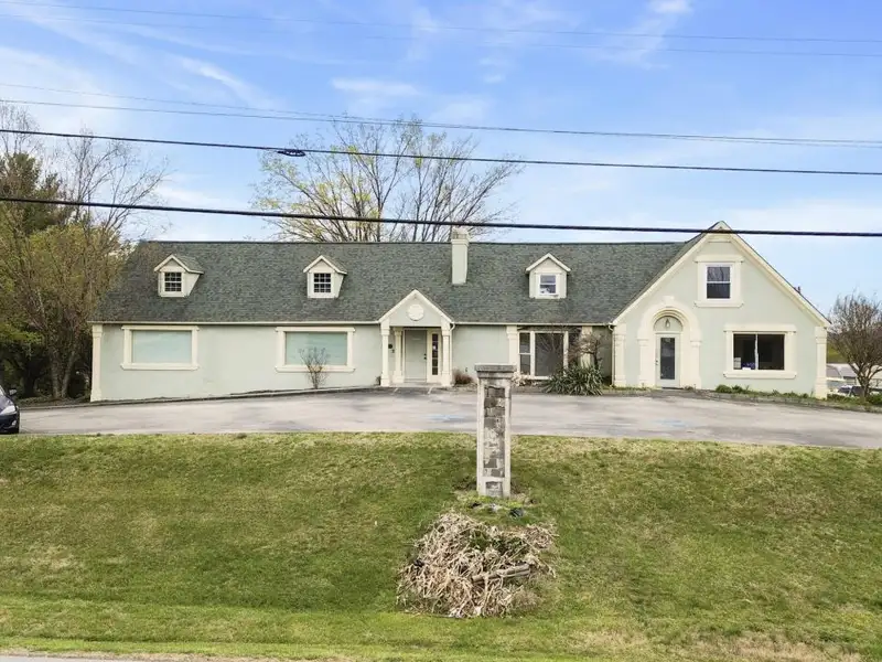 Versatile 4,305 Sq Ft Office Building with Apartment on Highway 11e