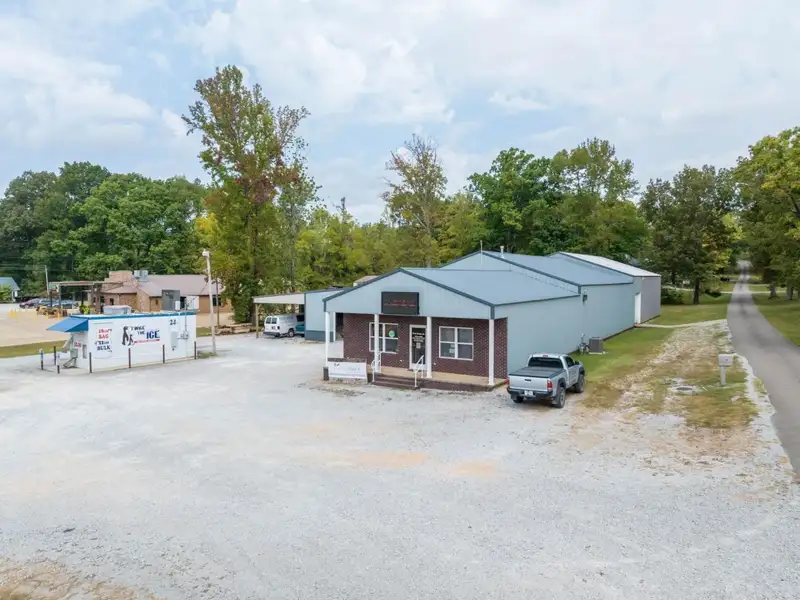 Large Commercial Building on Highway 412e in Parsons with Extensive Frontage and Warehouse Space