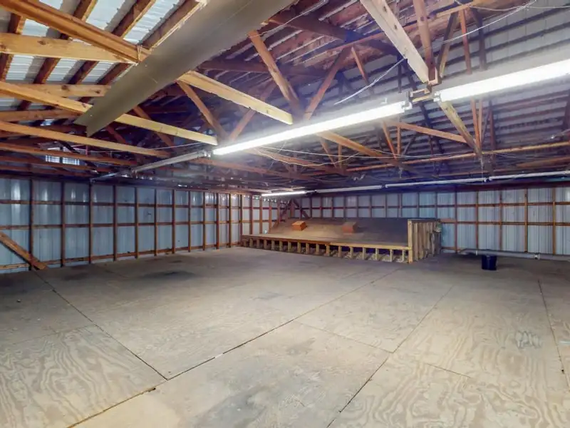 Commercial Property on Busy Highway - 2.1 Acres, 31,000 Sq Ft with Offices and Roll-up Doors