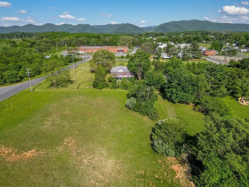 Classic American Foursquare Home in Need of Restoration with Detached Garage