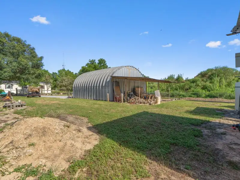 30x30 Enclosed Quonset Building with Pole Barn and Storage on Hwy 98